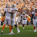 
              Tennessee wide receiver Cedric Tillman (4) is congratulated by offensive lineman Ollie Lane after Tillman scored a touchdown against Purdue in the first half of the Music City Bowl NCAA college football game Thursday, Dec. 30, 2019, in Nashville, Tenn. (AP Photo/Mark Humphrey)
            