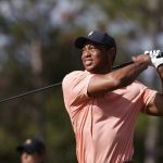 
              Tiger Woods watches his tee shot on the second hole during the first round of the PNC Championship golf tournament Saturday, Dec. 18, 2021, in Orlando, Fla. (AP Photo/Scott Audette)
            