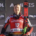 
              The winner, Norway's Henrik Kristoffersen, on podium after an alpine ski, men's World Cup giant slalom, in Alta Badia, Italy, Sunday, Dec.19, 2021. (AP Photo/Alessandro Trovati)
            