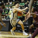 
              Oregon guard Will Richardson (0) drives to the basket against Arizona State during an NCAA college basketball game in Eugene, Ore., Sunday, Dec. 5, 2021. (AP Photo/Thomas Boyd)
            