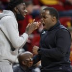 
              Chicago State head coach Gerald Gillion, right, celebrates a basket against Iowa State during the first half of an NCAA college basketball game Tuesday, Dec. 21, 2021, in Ames, Iowa. (AP Photo/Matthew Putney)
            