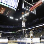 
              Creighton's Arthur Kaluma leaps for a shot while warming up before playing  Iowa State in an NCAA college basketball game Saturday, Dec. 4, 2021, at CHI Health Center in Omaha, Neb. (AP Photo/Rebecca S. Gratz)
            