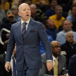 
              UCLA head coach Mick Cronin watches during the first half of an NCAA college basketball game against Marquette Saturday, Dec. 11, 2021, in Milwaukee. (AP Photo/Morry Gash)
            
