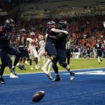 
              UTSA running back Sincere McCormick, center left, is lifted by a teammate as they celebrate his touchdown run against Western Kentucky during the second half of an NCAA college football game for the Conference USA championship Friday, Dec. 3, 2021, in San Antonio. (AP Photo/Eric Gay)
            