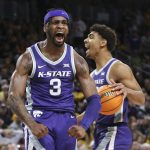 
              Kansas State guard Selton Miguel yells after dunking during the first half of an NCAA college basketball game against Wichita State, Sunday, Dec. 5, 2021, in Wichita, Kan. (Travis Heying/The Wichita Eagle via AP)
            