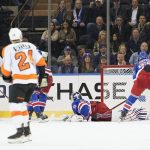 
              Philadelphia Flyers center Morgan Frost (48) /socres a goal past New York Rangers goaltender Igor Shesterkin (31) during the second period of an NHL hockey game, Wednesday, Dec. 1, 2021, at Madison Square Garden in New York. (AP Photo/Mary Altaffer)
            