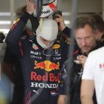 
              Red Bull driver Max Verstappen of the Netherlands gets ready during practice for the Formula One Abu Dhabi Grand Prix in Abu Dhabi, United Arab Emirates, Friday, Dec. 10, 2021. (AP Photo/Kamran Jebreili)
            
