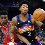 
              Phoenix Suns guard Elfrid Payton (2) vies for a rebound with Detroit Pistons guard Hamidou Diallo (6) during the first half of an NBA basketball game Thursday, Dec. 2, 2021, in Phoenix. (AP Photo/Ross D. Franklin)
            