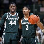 
              Michigan State's Jaden Akins, right, and Gabe Brown dribble out the clock at the end of an NCAA college basketball game against High Point, Wednesday, Dec. 29, 2021, in East Lansing, Mich. Michigan State won 81-68. (AP Photo/Al Goldis)
            