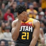 
              Utah Jazz center Hassan Whiteside reacts after being called for a foul during the first half of the team's NBA basketball game against the Dallas Mavericks on Saturday, Dec. 25, 2021, in Salt Lake City. (AP Photo/Rick Bowmer)
            