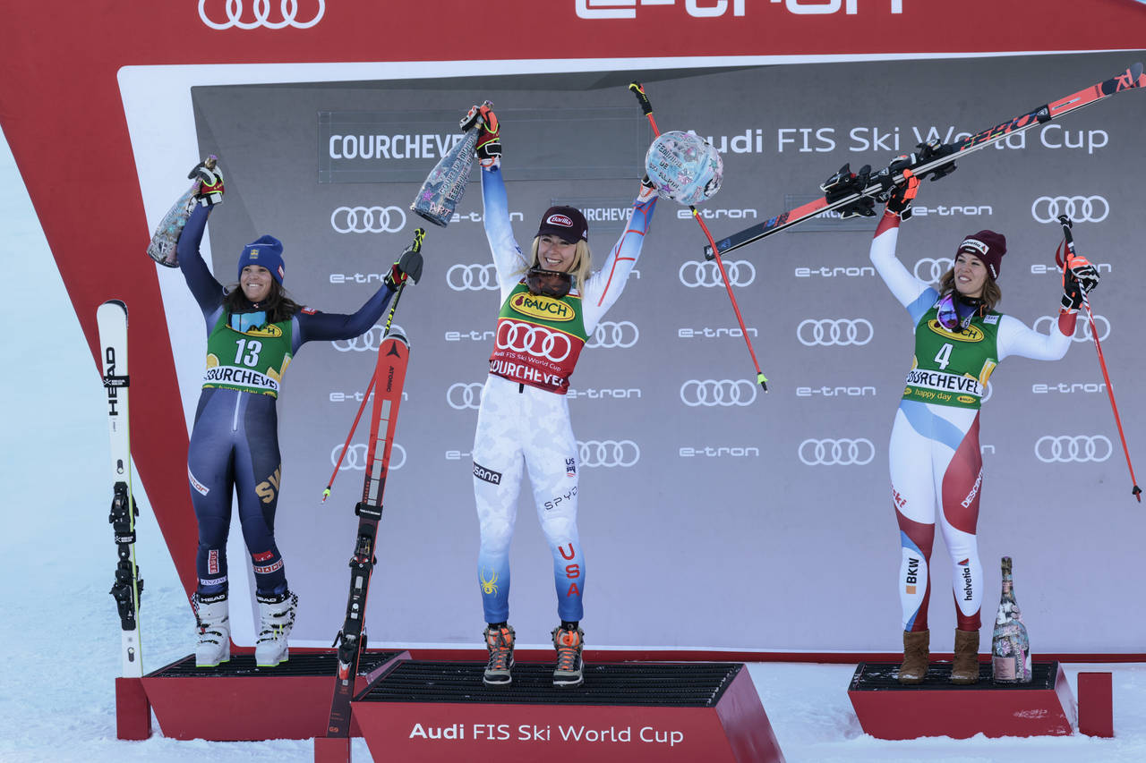 United States' Mikaela Shiffrin, center, winner of an alpine ski, women's World Cup giant slalom, p...