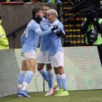 
              New York City FC forward Valentin Castellanos (11) celebrates with teammates after scoring a goal during the first half of the MLS Cup soccer match against Portland Timbers on Saturday, Dec. 11, 2021, in Portland, Ore. (AP Photo/Amanda Loman)
            