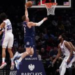 
              Brooklyn Nets forward Blake Griffin (2) goes to the basket past Philadelphia 76ers guard Matisse Thybulle (22) during the first half of an NBA basketball game, Thursday, Dec. 16, 2021, in New York. (AP Photo/Mary Altaffer)
            