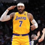 
              Los Angeles Lakers forward Carmelo Anthony reacts after making a 3-point basket during the first half of the team's NBA basketball game against the Houston Rockets, Tuesday, Dec. 28, 2021, in Houston. (AP Photo/Eric Christian Smith)
            