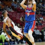 
              Washington Wizards forward Deni Avdija (9) goes to the basket as Miami Heat forward Caleb Martin defends during the first half of an NBA basketball game, Tuesday, Dec. 28, 2021, in Miami. (AP Photo/Lynne Sladky)
            
