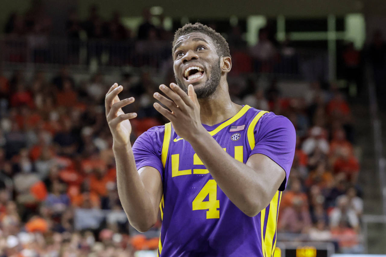 LSU forward Darius Days (4) reacts to a call during the second half of an NCAA college basketball g...
