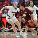 
              Boston College guard Makayla Dickens tries to drive past Louisville guard Hailey Van Lith, left, during the second half of an NCAA college basketball game in Louisville, Ky., Thursday, Dec. 30, 2021. Louisville won 79-49. (AP Photo/Timothy D. Easley)
            