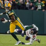 
              Green Bay Packers' Davante Adams gets past Chicago Bears' DeAndre Houston-Carson during the second half of an NFL football game Sunday, Dec. 12, 2021, in Green Bay, Wis. (AP Photo/Morry Gash)
            