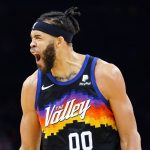 
              Phoenix Suns center JaVale McGee shouts after a Suns defensive stop against the Detroit Pistons during the first half of an NBA basketball game Thursday, Dec. 2, 2021, in Phoenix. (AP Photo/Ross D. Franklin)
            