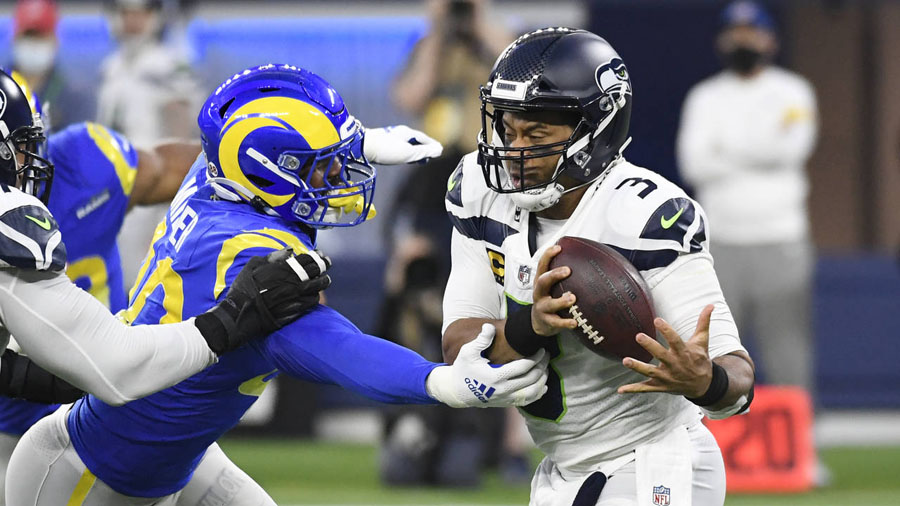 Rams LB Von Miller sacks Seahawks QB Russell Wilson in Seattle's 20-10 loss on Tuesday night. (AP P...