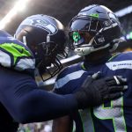 SEATTLE, WASHINGTON - JANUARY 02: DK Metcalf #14 of the Seattle Seahawks celebrates his touchdown catch during the third quarter against the Detroit Lions at Lumen Field on January 02, 2022 in Seattle, Washington. (Photo by Abbie Parr/Getty Images)