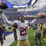 
              San Francisco 49ers cornerback Ambry Thomas (20) celebrates after catching an interception in overtime of an NFL football game against the Los Angeles Rams Sunday, Jan. 9, 2022, in Inglewood, Calif. The 49ers won 27-24. (AP Photo/Mark J. Terrill)
            