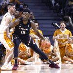 
              South Carolina forward Wildens Leveque (15) works for a sot against Tennessee forward John Fulkerson (10) during an NCAA college basketball game Tuesday, Jan. 11, 2022, in Knoxville, Tenn. (AP Photo/Wade Payne)
            