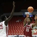 
              Stanford forward Harrison Ingram (55) passes the ball past Washington State forward Mouhamed Gueye (35) during the first half of an NCAA college basketball game, Thursday, Jan. 13, 2022, in Pullman, Wash. (AP Photo/Young Kwak)
            