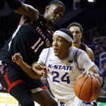 
              Kansas State guard Nijel Pack (24) attempts to get past Texas Tech forward Bryson Williams (11) during the second half of an NCAA college basketball game on Saturday, Jan. 15, 2022, in Manhattan, Kan. Kansas State beat Texas Tech 62-51. (AP Photo/Colin E. Braley)
            