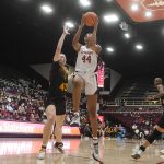 
              Stanford forward Kiki Iriafen (44) shoots in front of Arizona State center Imogen Greenslade (43) during the second half of an NCAA college basketball game in Stanford, Calif., Friday, Jan. 28, 2022. (AP Photo/Jeff Chiu)
            