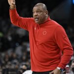 
              Philadelphia 76ers head coach Doc Rivers gestures to his players during the first half of an NBA basketball game against the San Antonio Spurs, Sunday, Jan. 23, 2022, in San Antonio. (AP Photo/Darren Abate)
            