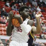 Washington State forward Mouhamed Gueye (35) secures a rebound during the second half of an NCAA college basketball game against California, Saturday, Jan. 15, 2022, in Pullman, Wash. (AP Photo/Young Kwak)