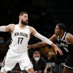 
              New Orleans Pelicans center Jonas Valanciunas (17) drives to the basket against Brooklyn Nets center Day'Ron Sharpe (20) during the first half of an NBA basketball game, Saturday, Jan. 15, 2022, in New York. (AP Photo/Noah K. Murray)
            