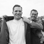 
              FILE -B ob Goalby gets the traditional green jacket as champion of the Masters golf tournament in Augusta, Ga., April 14, 1968, from the previous year's winner, Gay Brewer. Goalby was declared champion although he finished in a 277 tie with Roberto de Vicenzo of Argentina. De Vicenzo was pushed back to second after an error was discovered in his scorecard. Goalby has died. His death Wednesday, Jan. 19, 2022, in his hometown of Belleville, Ill., was confirmed by the PGA Tour and Bill Haas, his great nephew. Goalby was 92. (AP Photo, File)
            