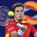 
              Pablo Carreno Busta of Spain makes a forehand return to Denis Shapovalov of Canada at the final match of the ATP Cup tennis tournament in Sydney, Sunday, Jan. 9, 2022. (Dean Lewins/AAP Image via AP)
            