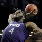 
              TCU center Eddie Lampkin puts up a shot during the first half of an NCAA college basketball game against Kansas State Wednesday, Jan. 12, 2022, in Manhattan, Kan. (AP Photo/Charlie Riedel)
            