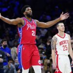 
              Philadelphia 76ers' Joel Embiid reacts after a dunk during the first half of an NBA basketball game against the Houston Rockets, Monday, Jan. 3, 2022, in Philadelphia. (AP Photo/Matt Slocum)
            