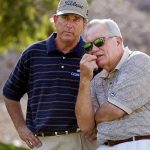 
              FILE - Jay Haas, left, talks to 1968 Masters champion Bob Goalby on the fifth hole at Indian Wells Country Club during the third round of the Bob Hope Chrysler Classic golf tournament Jan. 31, 2003, in Indian Wells, Calif. Goalby is also Haas' uncle. Goalby has died. His death Wednesday, Jan. 19, 2022, in his hometown of Belleville, Ill., was confirmed by the PGA Tour and Bill Haas, his great nephew. Goalby was 92. (AP Photo/Mark J. Terrill, File)
            