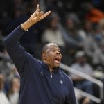 
              Georgetown head coach Patrick Ewing gestures during the second half of an NCAA college basketball game against Villanova, Saturday, Jan. 22, 2022, in Washington. Villanova won 85-74. (AP Photo/Nick Wass)
            