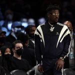 
              Former Tampa Bay Buccaneers wide receiver Antonio Brown arrives courtside during the second half of an NBA basketball game between the Memphis Grizzlies and the Brooklyn Nets, Monday, Jan. 3, 2022, in New York. (AP Photo/Adam Hunger)
            