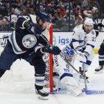 
              Columbus Blue Jackets' Jakub Voracek, left, tries to shoot the puck past Tampa Bay Lightning's Andrei Vasilevskiy during the second period of an NHL hockey game Tuesday, Jan. 4, 2022, in Columbus, Ohio. (AP Photo/Jay LaPrete)
            