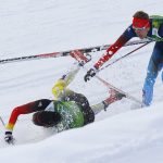 
              FILE - Germany's Tim Tscharnke falls in front of Russia's Nikita Kriukov, right, after making contact with the skis of Finland's Sami Jauhojaervi in the men's classical-style final of the cross-country team sprint competitions at the 2014 Winter Olympics, Feb. 19, 2014, in Krasnaya Polyana, Russia. Olympic and World Cup race organizers are already used to needing snow-making equipment to create a ribbon of white through the forests as natural snowfall becomes less reliable. Skiers and experts say manmade snow has a higher moisture content, making it ice up quickly.(AP Photo/Dmitry Lovetsky, File)
            