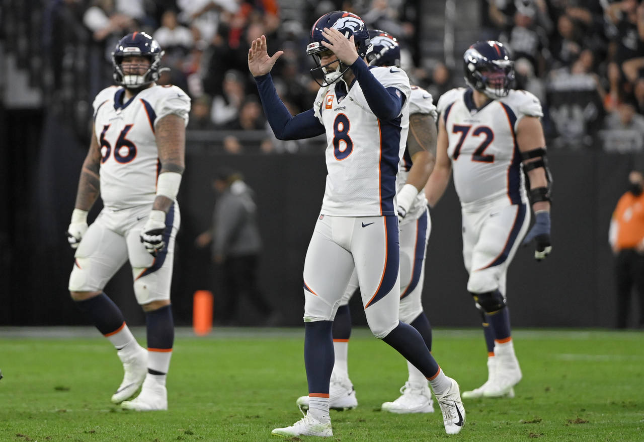 Denver Broncos kicker Brandon McManus (8) reacts after missing a field goal attempt against the Las...