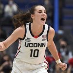 
              Connecticut's Nika Muhl (10) reacts in the first half of an NCAA college basketball game against Xavier, Saturday, Jan. 15, 2022, in Hartford, Conn. (AP Photo/Jessica Hill)
            