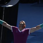 
              Rafael Nadal of Spain celebrates after defeating Adrian Mannarino of France in their fourth round match at the Australian Open tennis championships in Melbourne, Australia, Sunday, Jan. 23, 2022. (AP Photo/Hamish Blair)
            