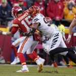 
              Kansas City Chiefs quarterback Patrick Mahomes (15) fumbles the ball as he is tackled by Cincinnati Bengals defensive end Sam Hubbard (94) during the second half of the AFC championship NFL football game, Sunday, Jan. 30, 2022, in Kansas City, Mo. (AP Photo/Paul Sancya)
            