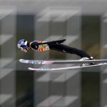 
              FILE -Ryoyu Kobayashi of Japan soars through the air during his second trial jump at the third stage of the 70th Four Hills ski jumping tournament in Innsbruck, Austria, Monday, Jan. 3, 2022. Even World-class athletes who compete in ski jumping and a former Olympian paid to analyze the sport have no idea who will win gold in Beijing. Defending Olympic champion Kamil Stoch has an injured left leg that is knocking him out of World Cup competition this week in his native Poland and puts his status for the 2022 Winter Olympics up in the air. Japan's Ryoyu Kobayashi is the world's top-ranked ski jumper. (AP Photo/Matthias Schrader, File)
            