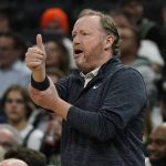 
              Milwaukee Bucks head coach Mike Budenholzer reacts during the first half of an NBA basketball game against the Chicago Bulls Friday, Jan. 21, 2022, in Milwaukee. (AP Photo/Morry Gash)
            