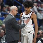 
              Connecticut coach Dan Hurley talks with Andre Jackson, right, during the second half of the team's NCAA college basketball game against Butler, Tuesday, Jan. 18, 2022, in Hartford, Conn. (AP Photo/Jessica Hill)
            