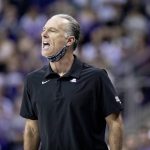 
              TCU head coach Jamie Dixon instructs his team in the first half of an NCAA college basketball game against LSU in Fort Worth, Texas, Saturday, Jan. 29, 2022. (AP Photo/Gareth Patterson)
            